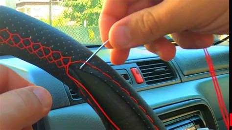 leather stitched steering wheel cover.